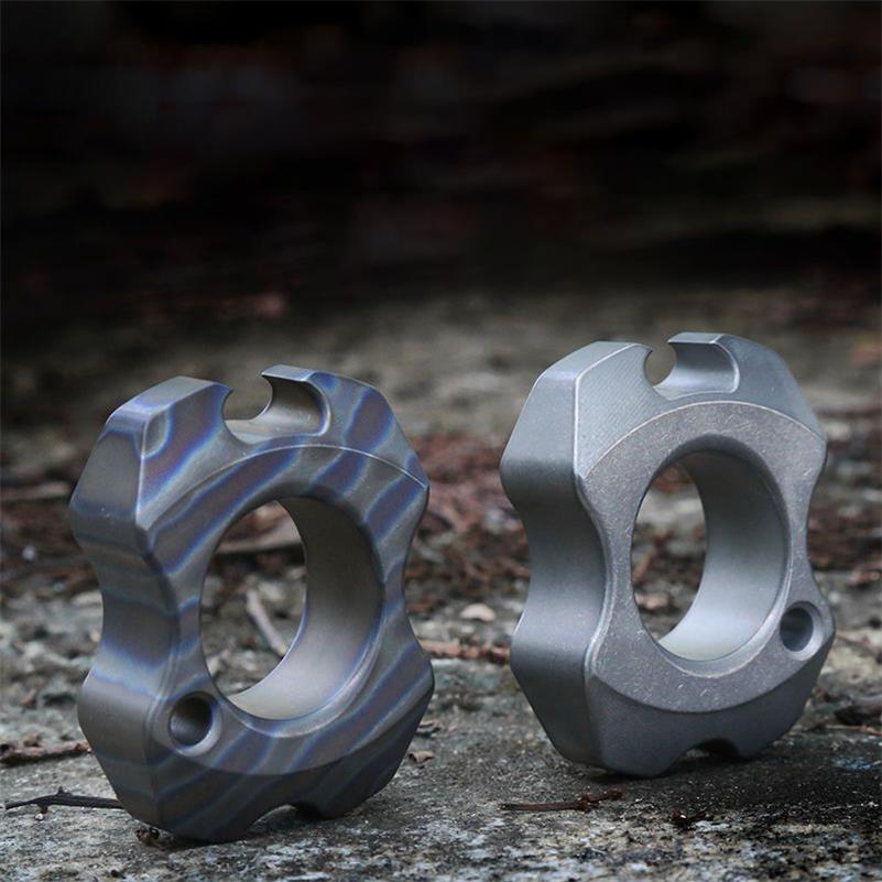 Mini Knuckle Duster Titanium Bottle Opener Pendant - Image 2